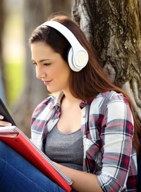 01 main image girl at park with head phone 14 03 34 426650